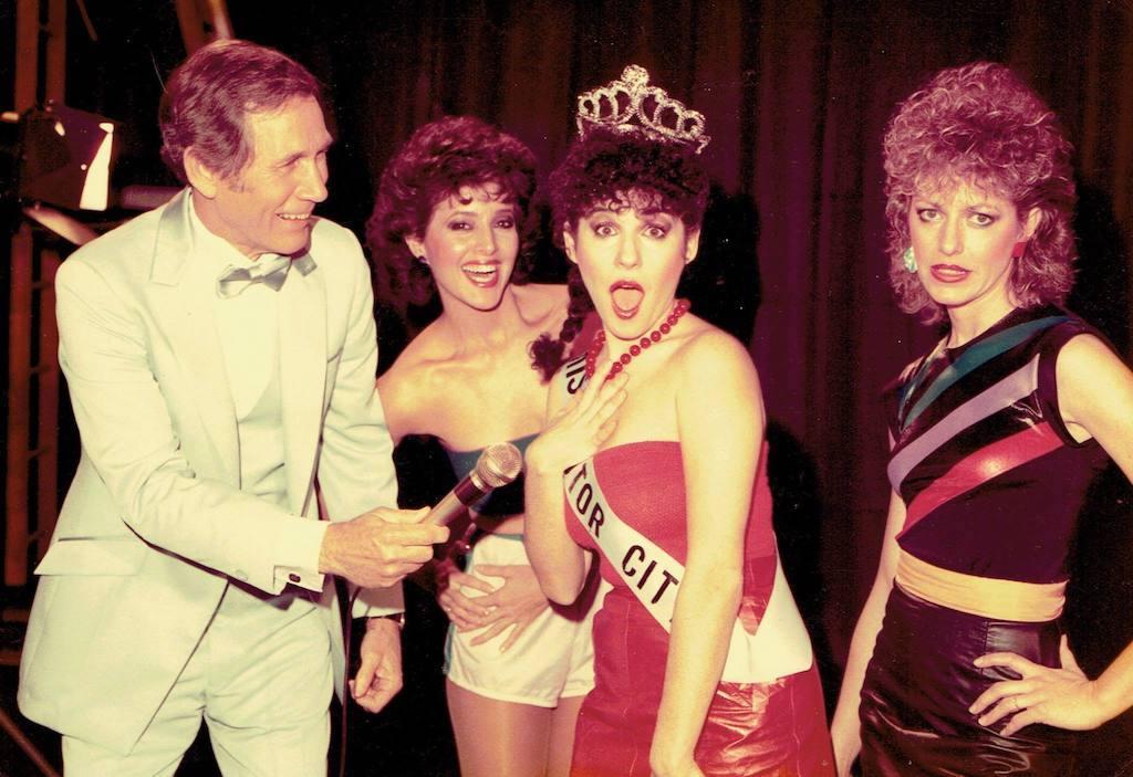 Photo of the Cherry Sisters with Lisa wearing a Motor City Sash and Tiera with Mel Tillis